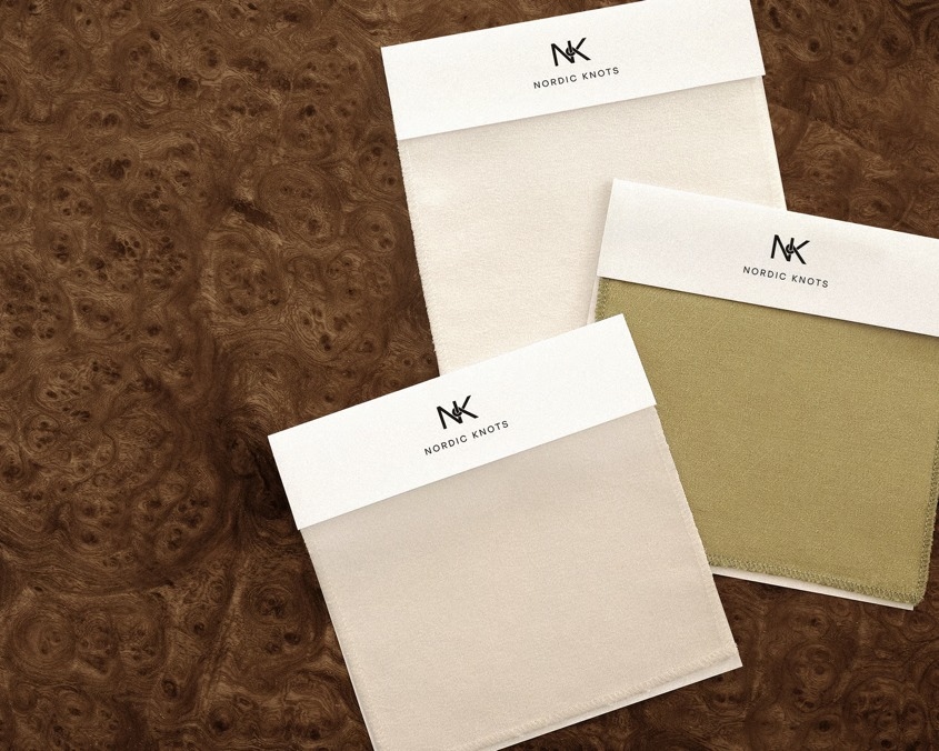 Fabric swatches on a wooden surface